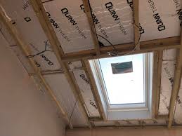 PIR insulation installed around Velux roof window during loft conversion in Borehamwood Hertfordshire